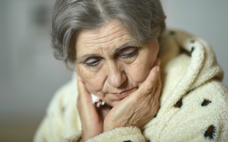 description_of-image_used_in_domestic_abuse_between_older_couples_sad_older_woman